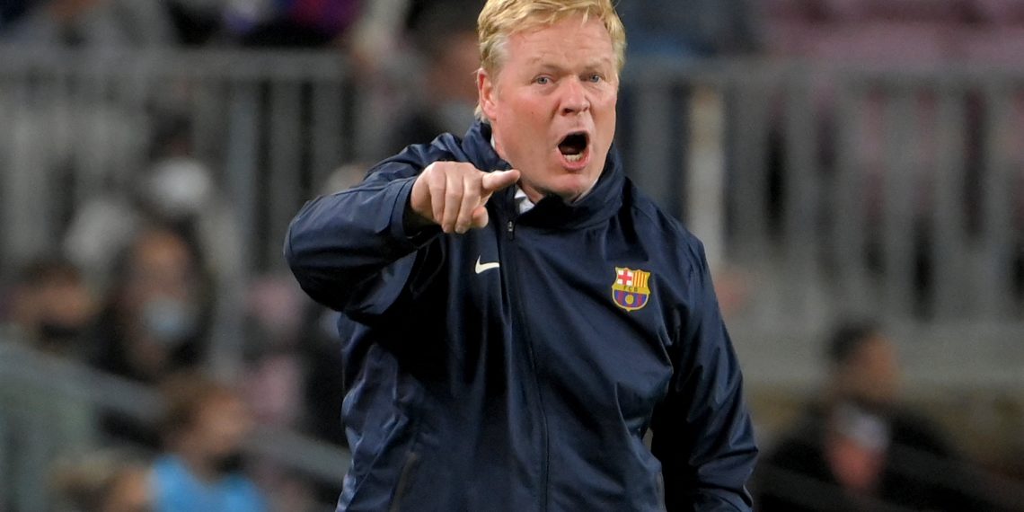 Barcelona's Dutch coach Ronald Koeman reacts during the Spanish League football match between FC Barcelona and Granada at the Camp Nou stadium in Barcelona on September 20, 2021. (Photo by LLUIS GENE / AFP)